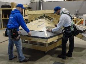 image of men working on a project