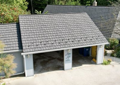 Two car garage with a metal roof